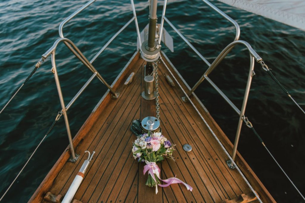 Wedding bouquet on wood yacht floor, a Florida beach wedding destination